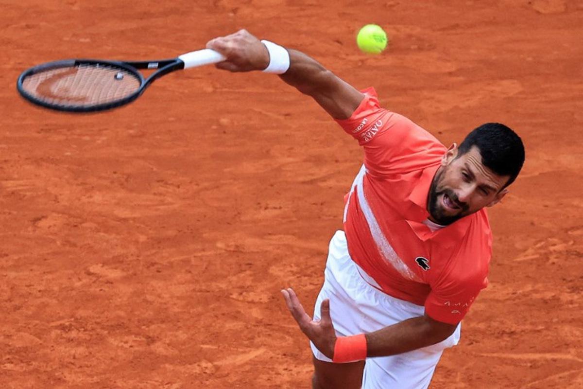 Serbia's Novak Djokovic serves to Chile's Alejandro Tabilo during the Monte Carlo ATP Masters Series Tournament round of 32 tennis match on the Ranier III court at the Monte Carlo Country Club in Roquebrune-Cap-Martin on April 9, 2025. Valery HACHE / AFP