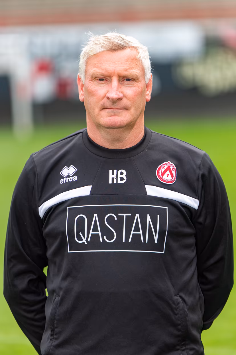 Kortrijk's assistant coach Kurt Bataille poses for a portrait picture at the 2025-2026 season photoshoot of Belgian soccer team KV Kortrijk, Wednesday 30 July 2025 in Kortrijk. BELGA PHOTO KURT DESPLENTER