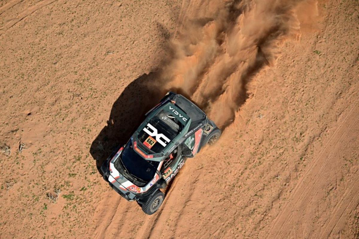 The Dacia Sandriders' Qatari driver Nasser Al-Attiyah and Belgian co-pilot Fabian Lurquin compete in the Stage 5 of the 48th edition of the Dakar Rally 2026, between Al-Ula and Hail, Saudi Arabia, on January 8, 2026. Giuseppe CACACE / AFP