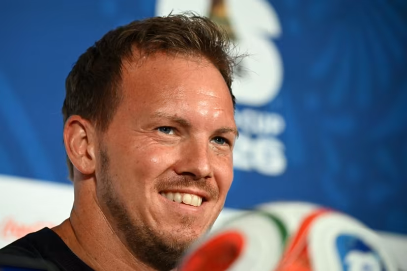 Germany's head coach Julian Nagelsmann smiles during a press conference at the Houston Stadium in Houston on June 13, 2026, on the eve of the 2026 World Cup football match between Germany and Curacao. RONALDO SCHEMIDT / AFP