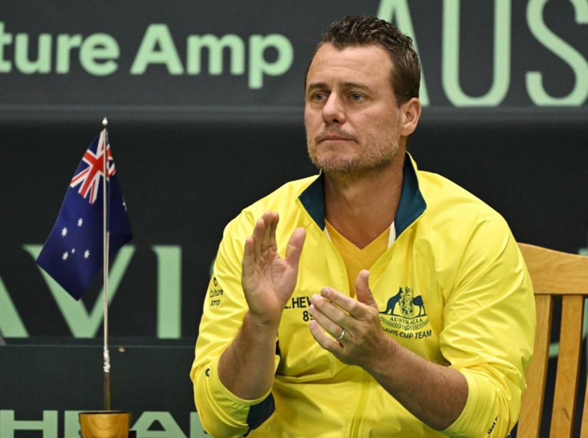 Australia's national team captain and former tennis player Lleyton Hewitt claps his hands during the single match between Sweden's Leo Borg (unseen)and Australia's John Peers (unseen) in the Davis Cup match between Sweden and Australia at the Royal Tennis Hall in Stockholm, Sweden, on February 1 2025. Jonas EKSTROMER / TT NEWS AGENCY / AFP