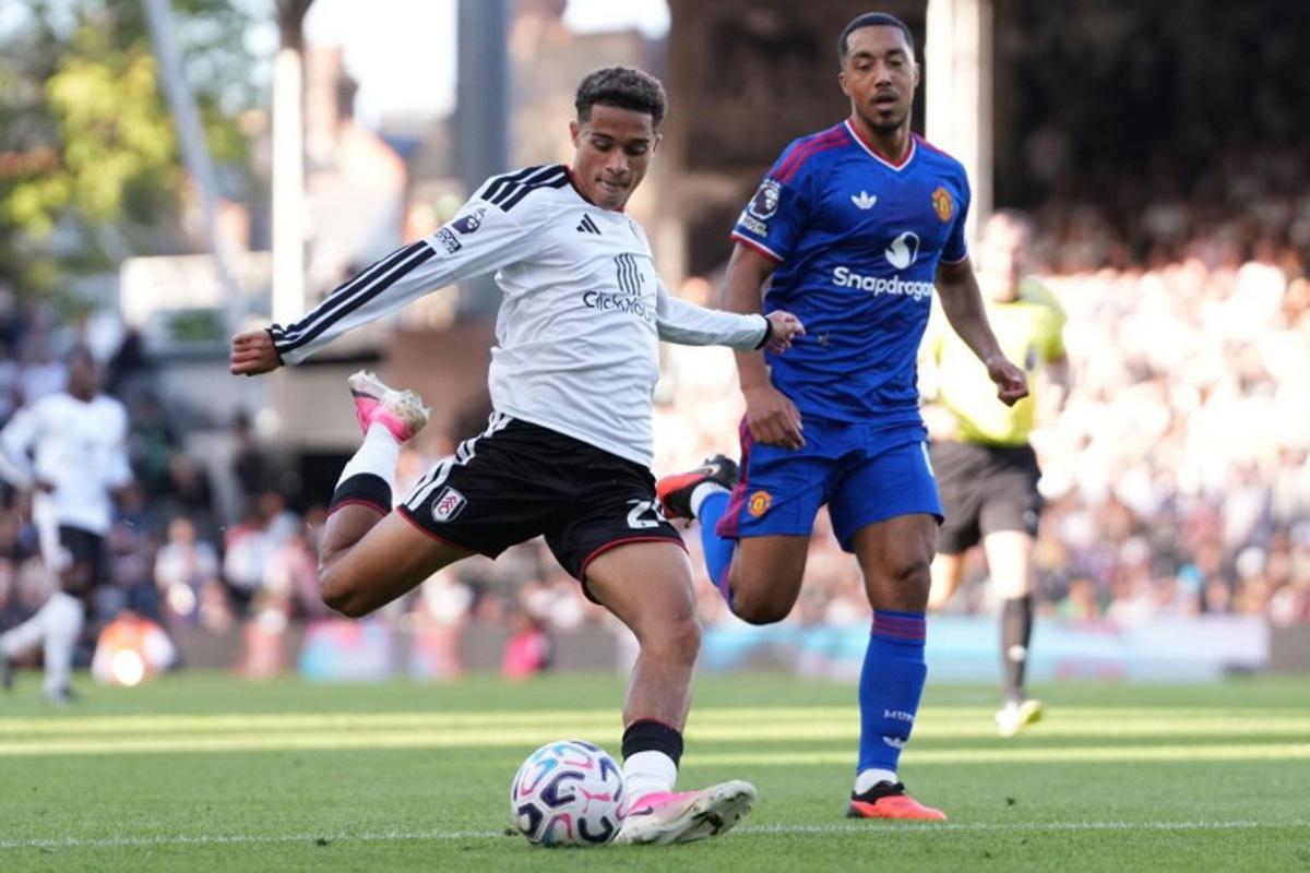 Fulham's English midfielder #24 Josh King shoots but fails to score during the English Premier League football match between Fulham and Manchester United at Craven Cottage in London on September 20, 2026. CARLOS JASSO / AFP