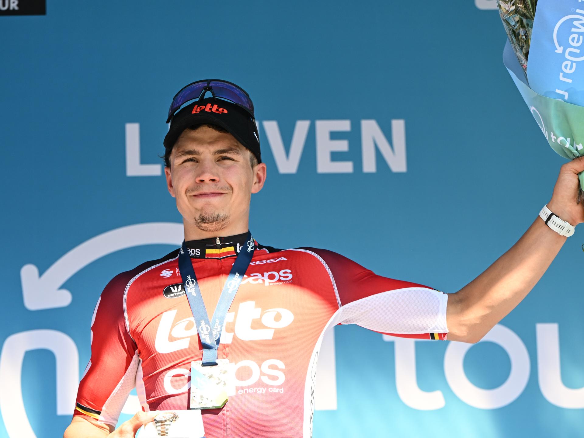 Belgian Arnaud De Lie of Lotto Cycling Team celebrates on the podium after winning the fifth and last stage of the 'Renewi Tour' multi-stage cycling race, 185km from and to Leuven on Sunday 24 August 2025. The five-day race takes place in Belgium and the Netherlands. BELGA PHOTO DAVID PINTENS