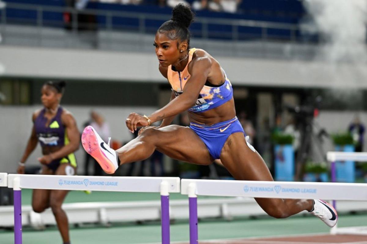 USA's Masai Russell competes in the women's 100m hurdles event during the Shanghai/Keqiao Diamond League athletics meeting in Keqiao, Shaoxing in China's eastern Zhejiang province on May 16, 2026. WANG Zhao / AFP