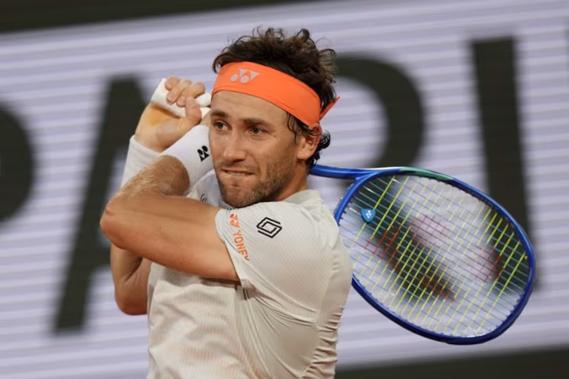 Norway's Casper Ruud plays a backhand return to Brazil's Joao Fonseca during their men's singles match on day 8 of the French Open tennis tournament on Court Philippe-Chatrier at the Roland-Garros Complex in Paris on May 31, 2026. Dimitar DILKOFF / AFP
