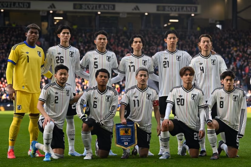 (Back row L-R) Japan's goalkeeper Zion Suzuk, Japan's forward Keisuke Goto, Japan's defender Tsuyoshi Watanabe, Japan's midfielder Ao Tanaka, Japan's defender Hiroki Ito and Japan's defender Ayumu Seko, (front row L-R) Japan's defender Yukinari Sugawara, Japan's midfielder Joel Chima Fujita, Japan's forward Daizen Maeda, Japan's midfielder Kodai Sano and Japan's midfielder Yuito Suzuki pose for a team photo ahead of the friendly International football match between Scotland and Japan at Hampden Park, in Glasgow, on March 28, 2026. ANDY BUCHANAN / AFP