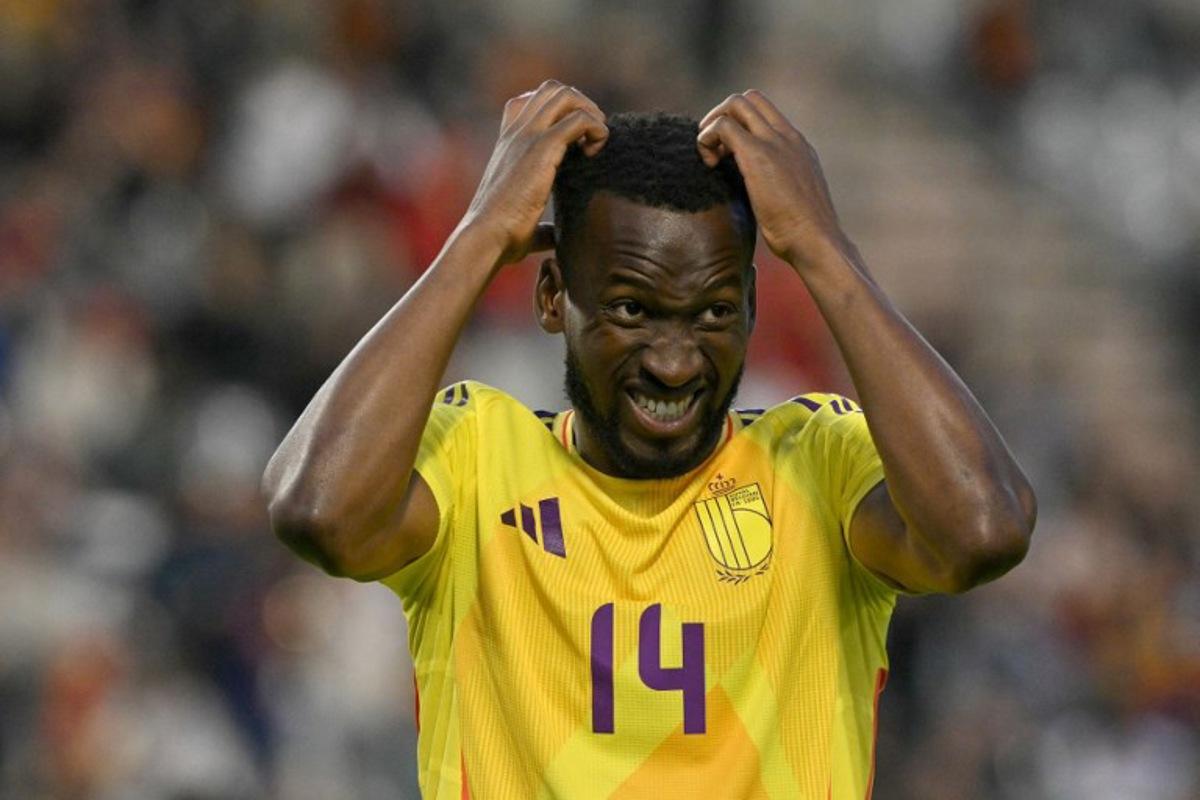 Belgium's midfielder #14 Dodi Lukebakio reacts after missing a goal scoring opportunity during the FIFA World Cup 2026 Group J European qualification football match between Belgium and Wales at the King Baudouin Stadium in Brussels, on June 9, 2025. NICOLAS TUCAT / AFP