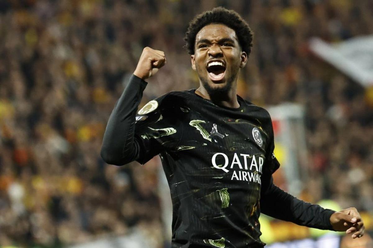 Paris Saint-Germain's French forward #49 Ibrahim Mbaye celebrates after scoring a goal during the French L1 football match between RC Lens and Paris Saint-Germain (PSG) at the Stade Bollaert-Delelis stadium in Lens on May 13, 2026. SIMON WOHLFAHRT / AFP