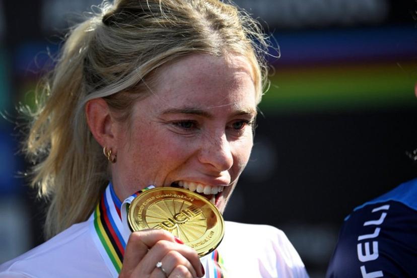 First-placed Demi Vollering of the Netherlands poses on the podium after the Women's Elite Road Race at the 2026 Union Cycliste Internationale (UCI) Road World Championships in Montreal, Quebec, on September 26, 2026. Andrej Ivanov / AFP