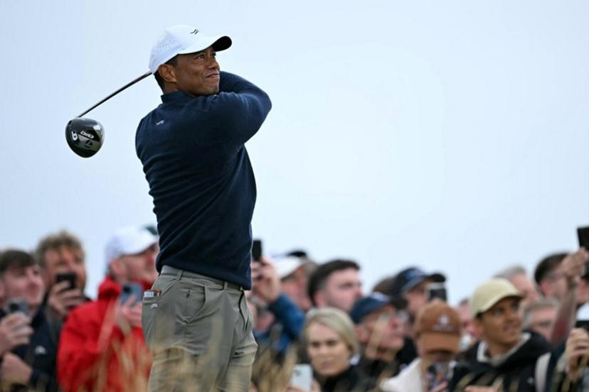 US golfer Tiger Woods watches his drive from the 4th tee during his second round, on day two of the 152nd British Open Golf Championship at Royal Troon on the south west coast of Scotland on July 19, 2024. Paul ELLIS / AFP