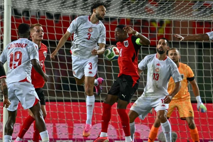Austria's defender #08 David Alaba and Tunisia's defender #03 Montassar Talbi vie for the ball during the friendly football match between Austria and Tunisia in Vienna, Austria on June 1, 2026 ahead of the 2026 FIFA World Cup football tournament. Joe Klamar / AFP