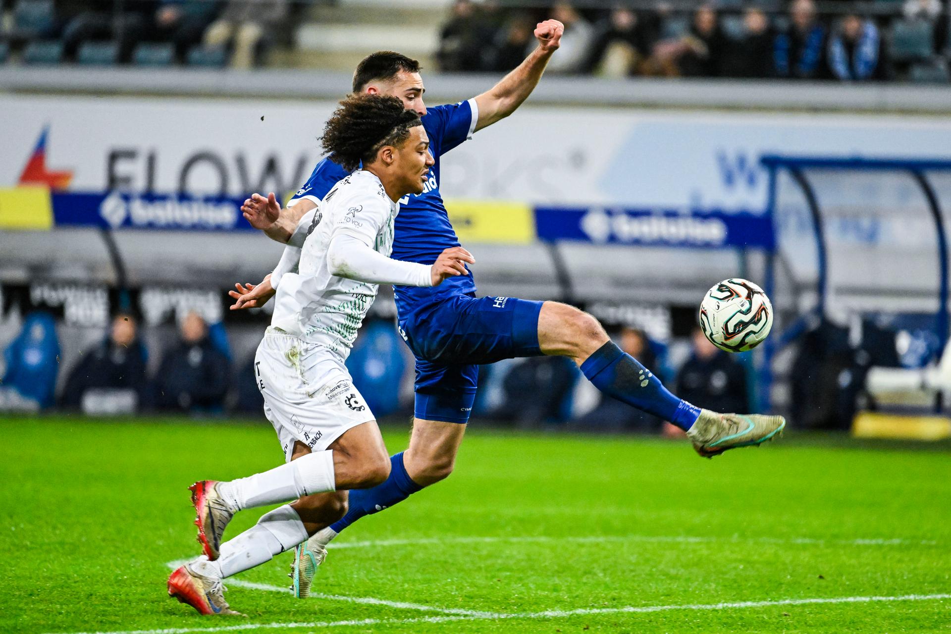 Cercle's Oluwaseun Adewumi and Gent's Matties Volckaert pictured in action during a soccer match between KAA Gent and Cercle Brugge, Friday 20 February 2026 in Gent, on day 26 of the 2025-2026 'Jupiler Pro League' first division of the Belgian championship. BELGA PHOTO TOM GOYVAERTS