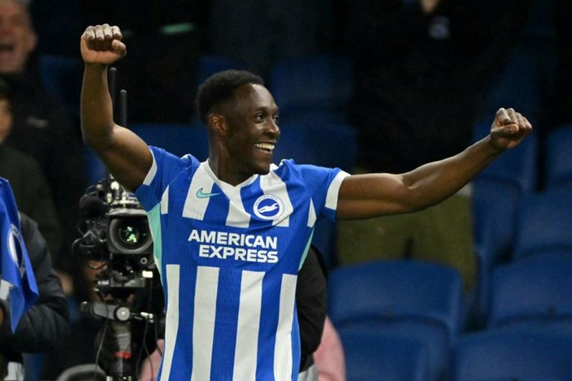 Brighton's English striker #18 Danny Welbeck celebrates after scoring their third goal during the English Premier League football match between Brighton and Hove Albion and Chelsea at the American Express Community Stadium in Brighton, southern England on April 21, 2026. Glyn KIRK / AFP