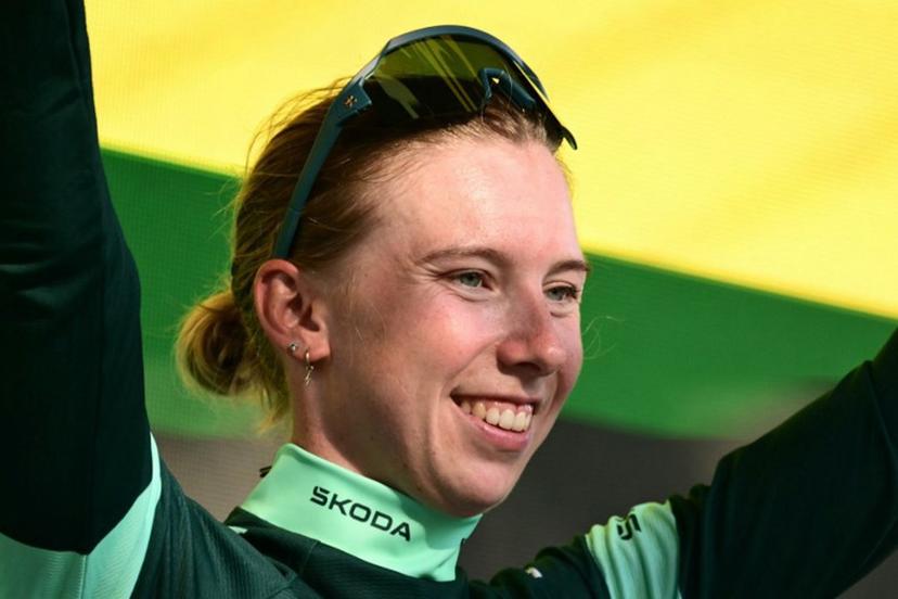 Team SD Worx-Protime's Dutch rider Lorena Wiebes celebrates on the podium with the best sprinter's green jersey after the individual time-trial in the 4th (out of 9) stage of the fifth edition of the Women's Tour de France cycling race, 21 km time trial between Gevrey-Chambertin and Dijon, in Dijon, eastern France on August 4, 2026. NICOLAS TUCAT / AFP
