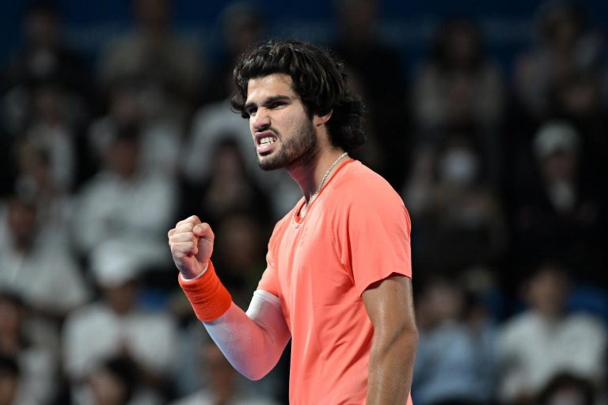 Spain's Carlos Alcaraz reacts after a point against Czech Republic's Jiri Lehecka in the men's singles final during the Japan Open tennis tournament at the Ariake Tennis Forest Park in Tokyo on October 6, 2026. Rie KIKUCHI / AFP
