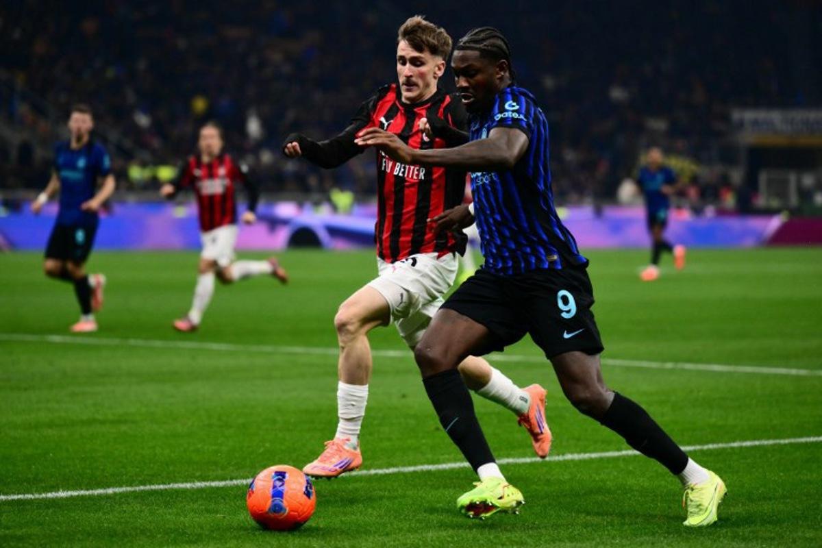 AC Milan's Begian midfielder #56 Alexis Saelemaekers and Inter Milan's French forward #09 Marcus Thuram vie for the ball during the Italian Serie A football match between Inter Milan and AC Milan at San Siro stadium in Milan, northern Italy, on November 23, 2025. Marco BERTORELLO / AFP