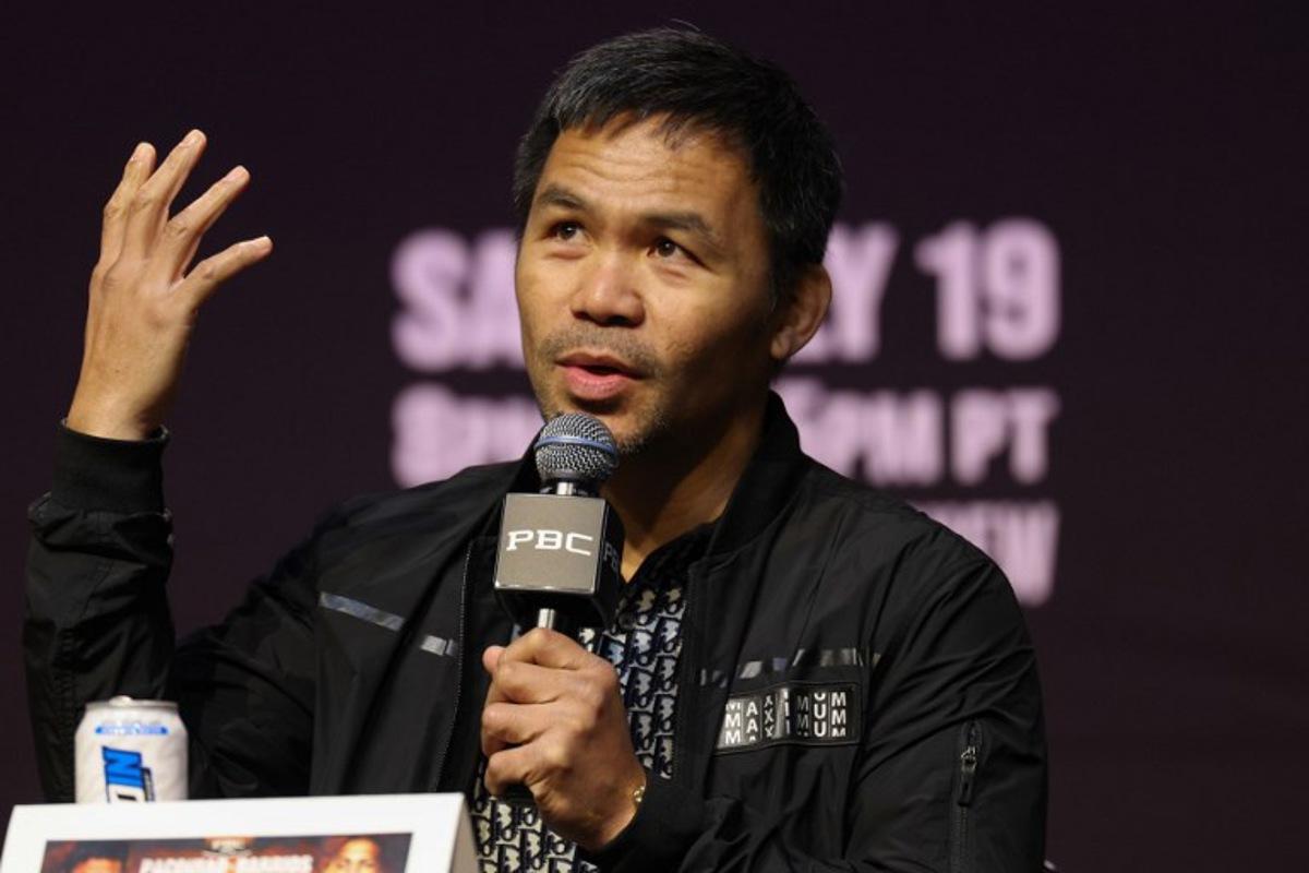 Filipino boxer Manny Pacquiao speaks during the press conference ahead of his July 19 WBC welterweight title fight against Mexican-US boxer Mario Barrios at the NOVO at L.A. Live in Los Angeles on June 3, 2025. Manny Pacquiao on June 3 shrugged off concerns about his decision to return to boxing at the age of 46 as he prepares for next month's world welterweight title comeback against Mario Barrios. The charismatic Filipino boxing icon stunned the sports world last month after announcing he would take on World Boxing Council (WBC) champion Barrios on July 19 in Las Vegas, four years after his last fight ended in a disappointing defeat. Patrick T. Fallon / AFP
