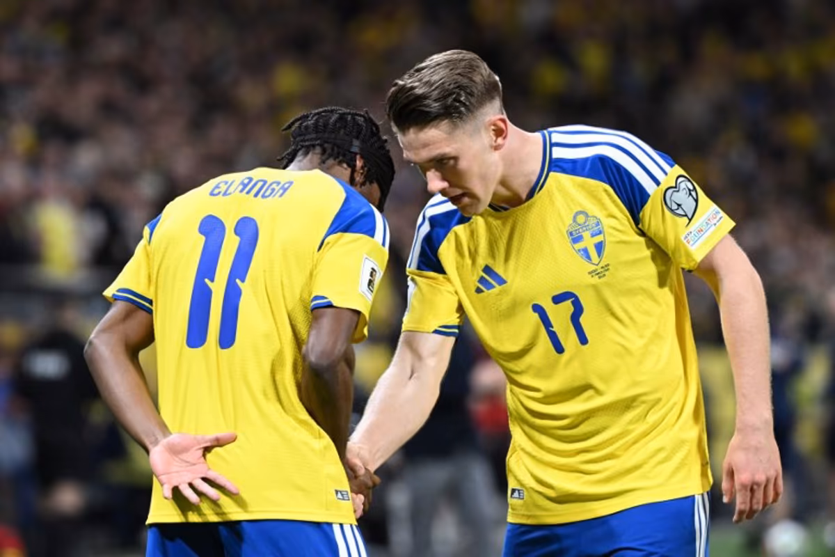 Sweden's midfielder #11 Anthony Elanga celebrates scoring his team's first goal with Sweden's forward #17 Viktor Gyokeres during the FIFA World Cup 2026 European qualification final football match between Sweden and Poland in Solna, Sweden, on March 31, 2026. Jonathan Nackstrand / AFP