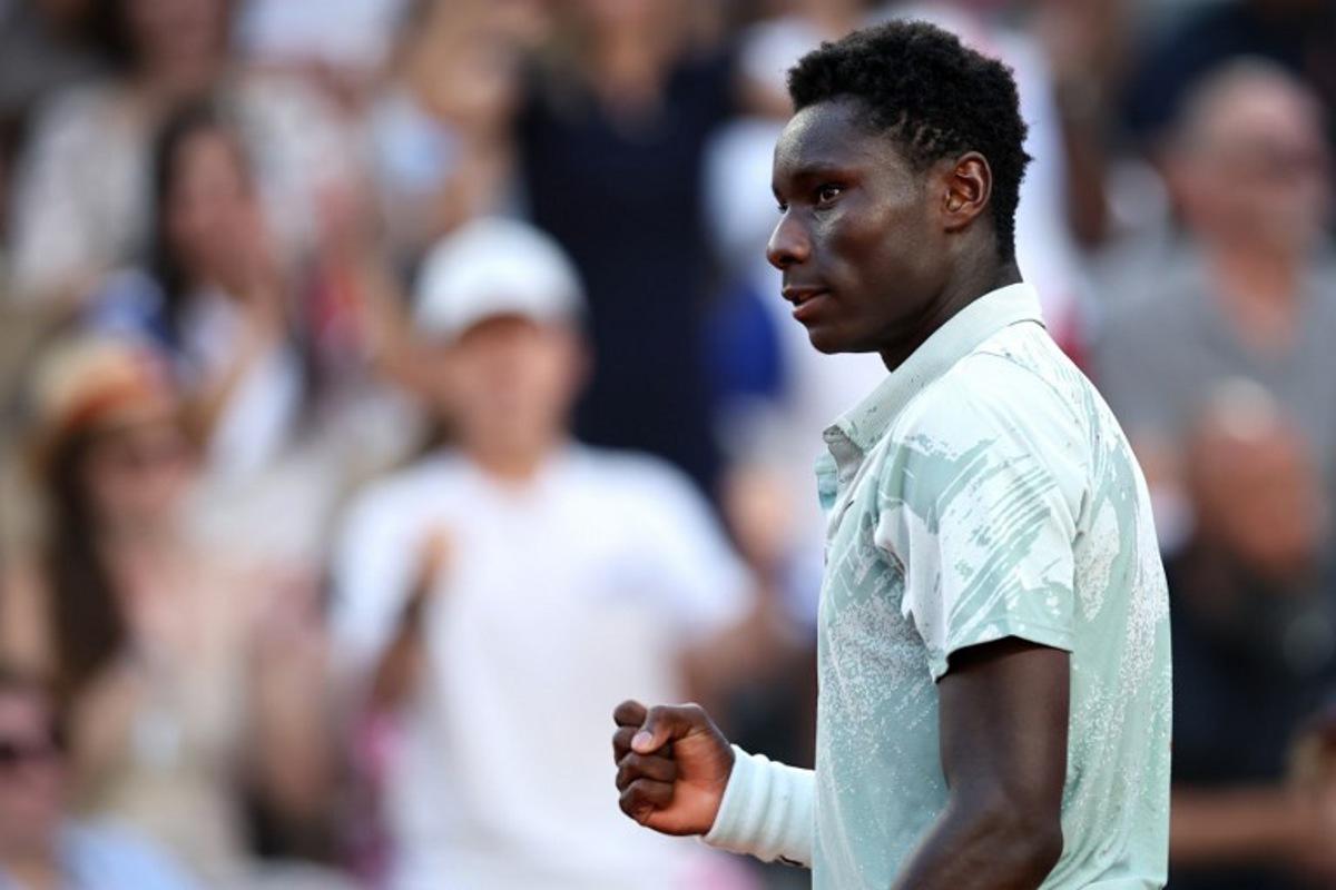France's Moise Kouame reacts to a point against Chile's Alejandro Tabilo during their men's singles match on day 7 of the French Open tennis tournament on Court Suzanne-Lenglen at the Roland-Garros Complex in Paris on May 30, 2026. Anne-Christine POUJOULAT / AFP