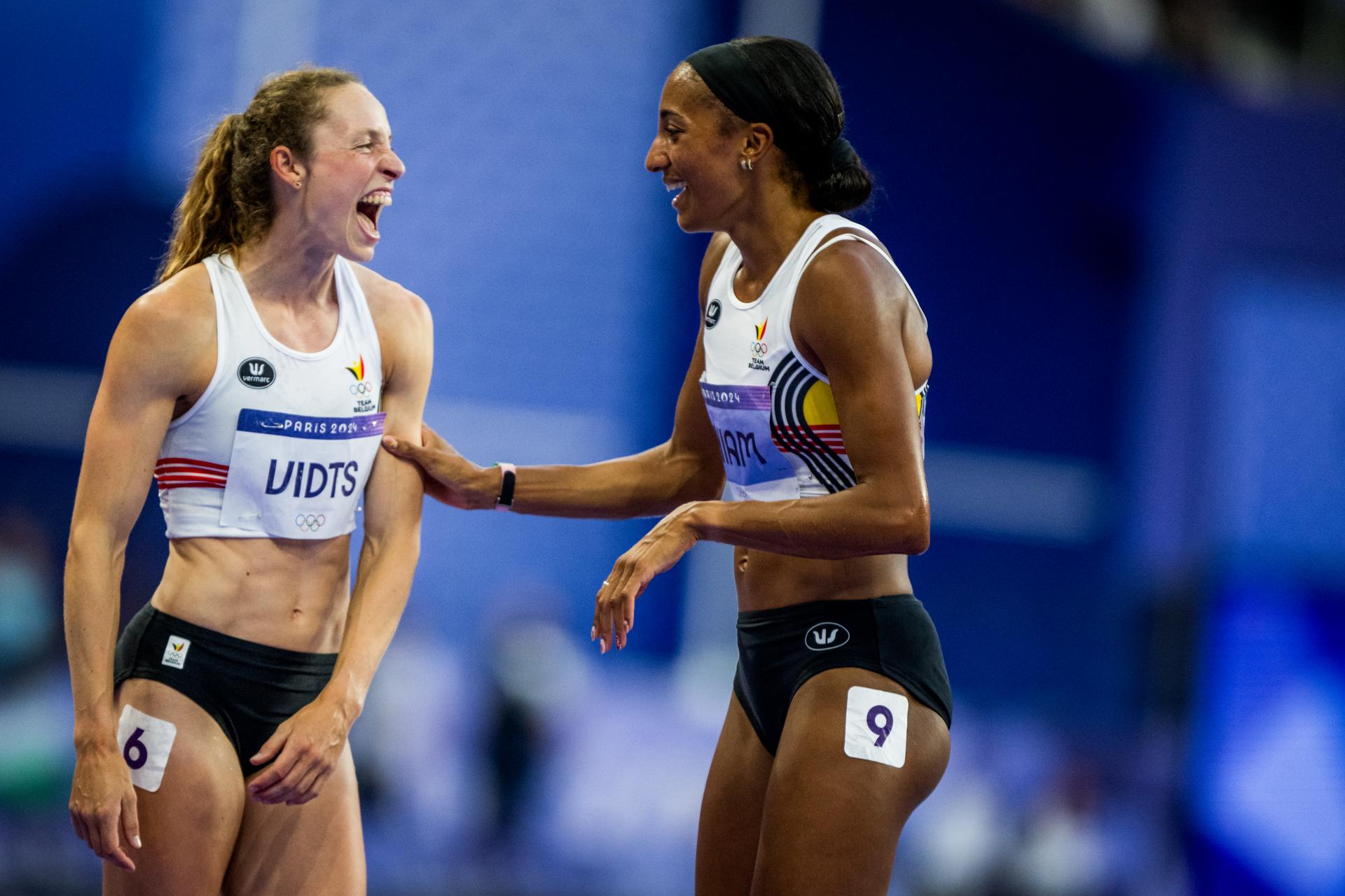 Belgian athlete Noor Vidts and Belgian athlete Nafissatou Nafi Thiam pictured after the 800m, seventh and final event of the women's heptathlon at the athletics competition at the Paris 2024 Olympic Games, on Friday 09 August 2024 in Paris, France. The Games of the XXXIII Olympiad are taking place in Paris from 26 July to 11 August. The Belgian delegation counts 165 athletes competing in 21 sports. BELGA PHOTO JASPER JACOBS