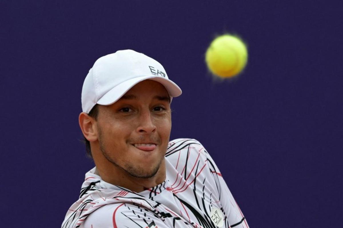 Italy's Luciano Darderi eyes the ball during his final match against Argentina's Francisco Cerundolo at the ATP 250 Argentina Open in Buenos Aires on February 15, 2026. JUAN MABROMATA / AFP