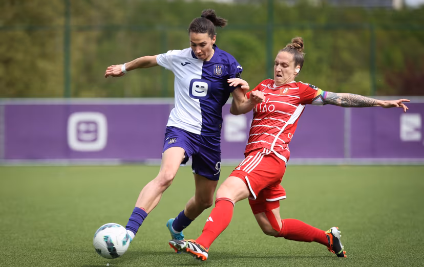 RSCA's Amelie Delabre and Standard Femina's Maud Coutereels fight for the ball during a soccer game between KAA Gent Ladies and RSCA Women, Saturday 27 April 2024 in Brussels, on day 6 of the play-off group A of the Super League women's championship. BELGA PHOTO VIRGINIE LEFOUR