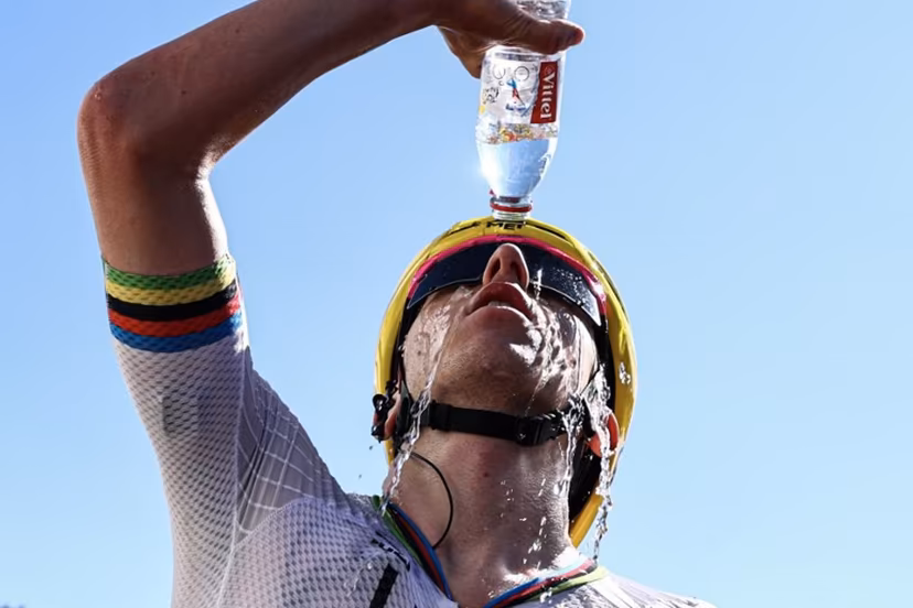 UAE Team Emirates - XRG's Slovenian rider Tadej Pogacar douses himself with water as he celebrates after winning the 3rd stage of the 113th edition of the Tour de France cycling race, 196 km between Granollers and Les Angles in southern France, on July 6, 2026. Anne-Christine POUJOULAT / POOL / AFP