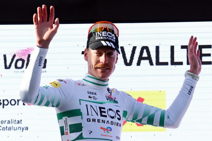 Overall ranking leader Team Ineos' French rider Dorian Godon waves from the podium after the 4th stage of the 2026 Volta a Catalunya cycling tour of Catalonia, a 151 km race between Mataro and Camprodon, on March 26, 2026. Josep LAGO / AFP