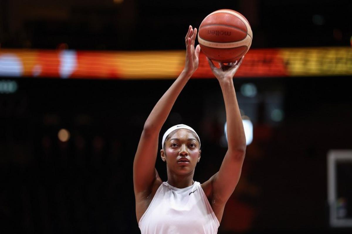 USA's forward #15 Angel Reese practises shooting during the warm up prior to the 2026 FIBA Women's Basketball World Cup quarter-final match between USA and Hungary at the Berlin Arena in Berlin on September 10, 2026. Ronny HARTMANN / AFP