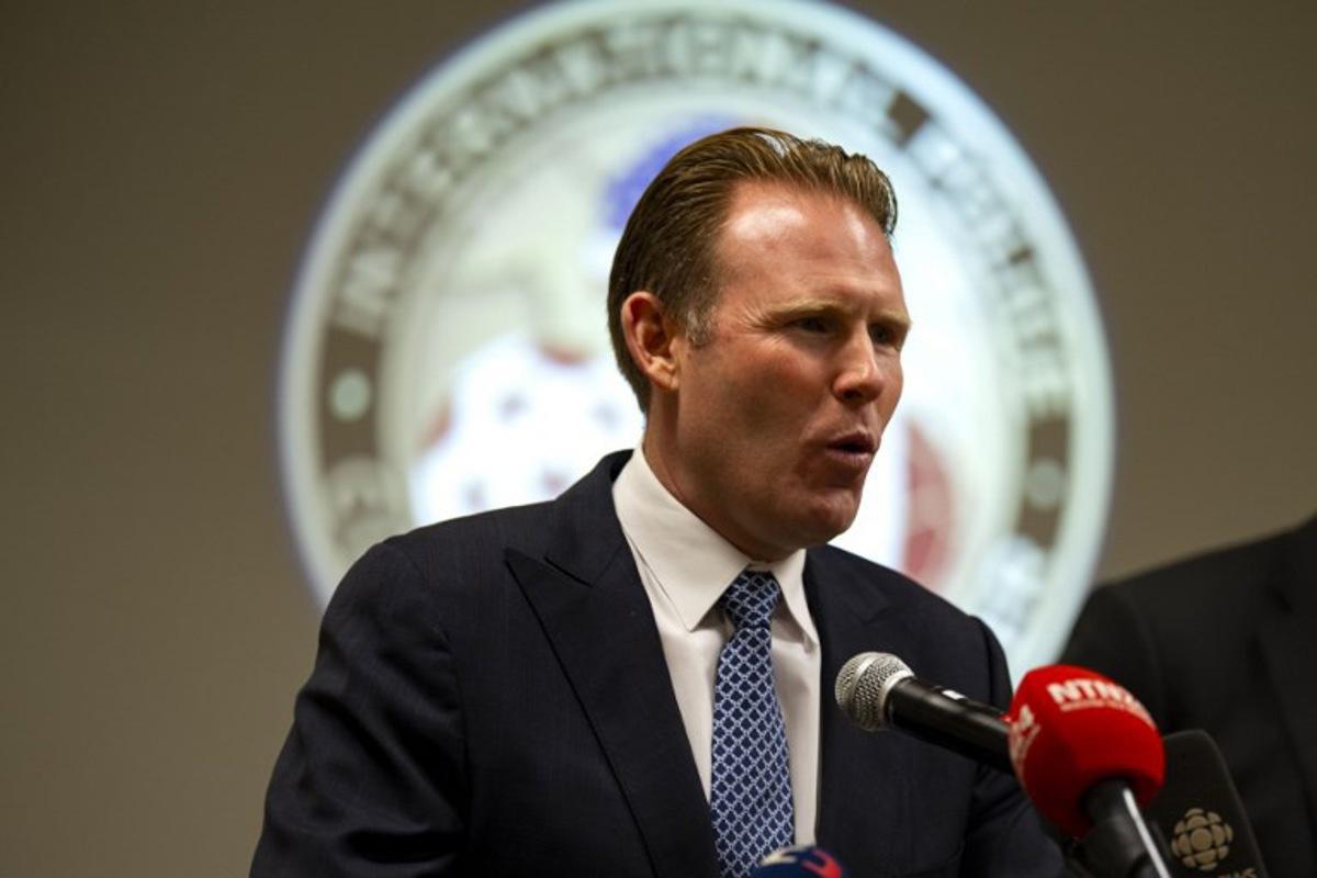 Andrew Giuliani, Executive Director of the White House Task Force on the FIFA World Cup 2026 and FBI Special Agent in Charge Doug Olson, Senior Coordinating Official for the 2026 FIFA World Cup participate in a Q and A session with members of the press at the International Police Cooperation Center for the 2026 FIFA World Cup at The National Conference Center in Leesburg, Virginia on June 29, 2026. Kent Nishimura / AFP