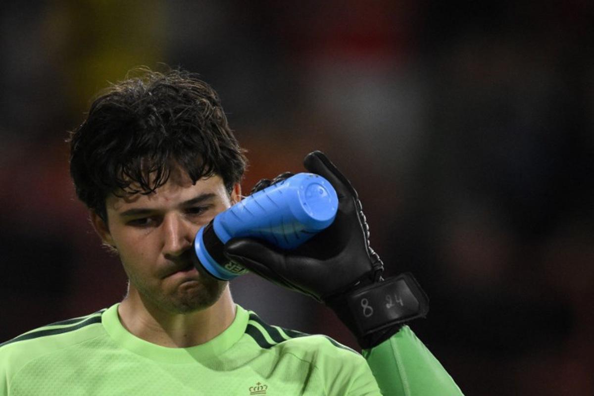 Belgium's goalkeeper #01 Senne Lammens drinks from his bottle during the UEFA Nations League, League A - Group 1, football match between Belgium and Turkey at the Maurice Dufrasne stadium, in Liege, eastern Belgium on October 2, 2026. JOHN THYS / AFP