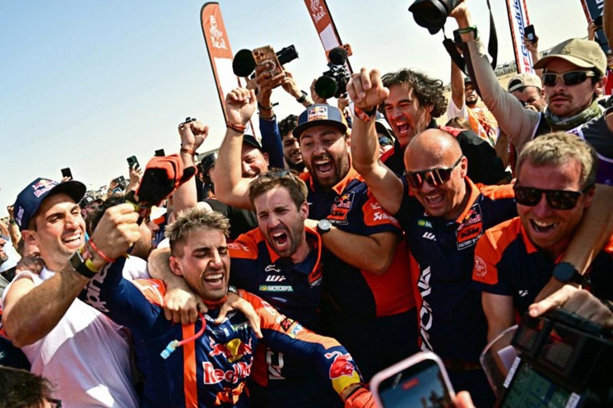 Argentine rider Luciano Benavides (2L) with a Ktm 450 Rally Factory celebrates with his teammates after winning the 48th edition of the Dakar Rally 2026 in Yanbu, Saudi Arabia, on January 17, 2026. Giuseppe CACACE / AFP