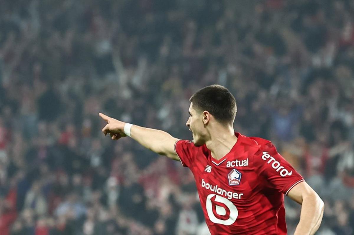Lille's Belgian forward #07 Matias Fernandez-Pardo celebrates scoring his team's first goal during the French L1 football match between Lille OSC and FC Lorient at the Stade Pierre-Mauroy in Villeneuve-d'Ascq, northern France on March 8, 2026. Sameer Al-DOUMY / AFP