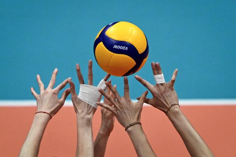 China's players attempt to block a ball in the women's gold medal volleyball event against Japan during the Hangzhou 2022 Asian Games in Hangzhou, in China's eastern Zhejiang province on Octorber 7, 2023. WANG Zhao / AFP