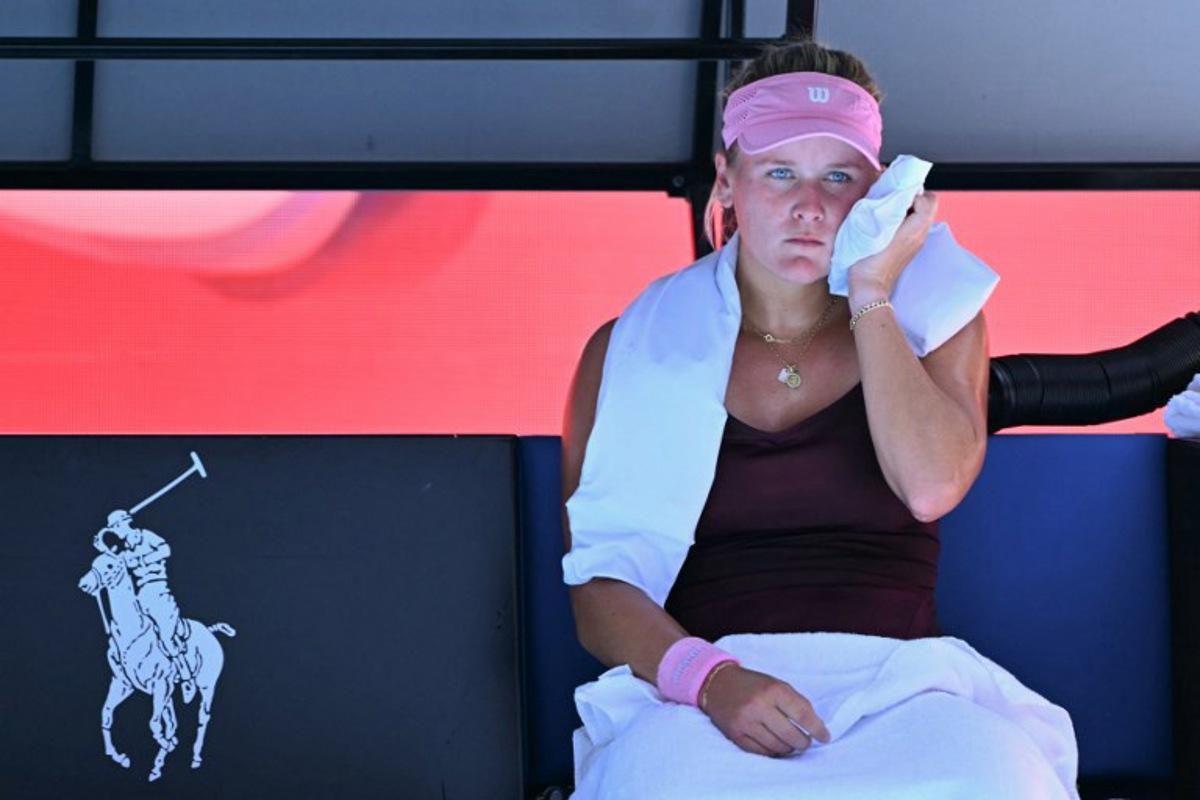 USA's Peyton Stearns rests during her women's singles match against USA's Amanda Anisimova on day seven of the Australian Open tennis tournament in Melbourne on January 24, 2026. WILLIAM WEST / AFP