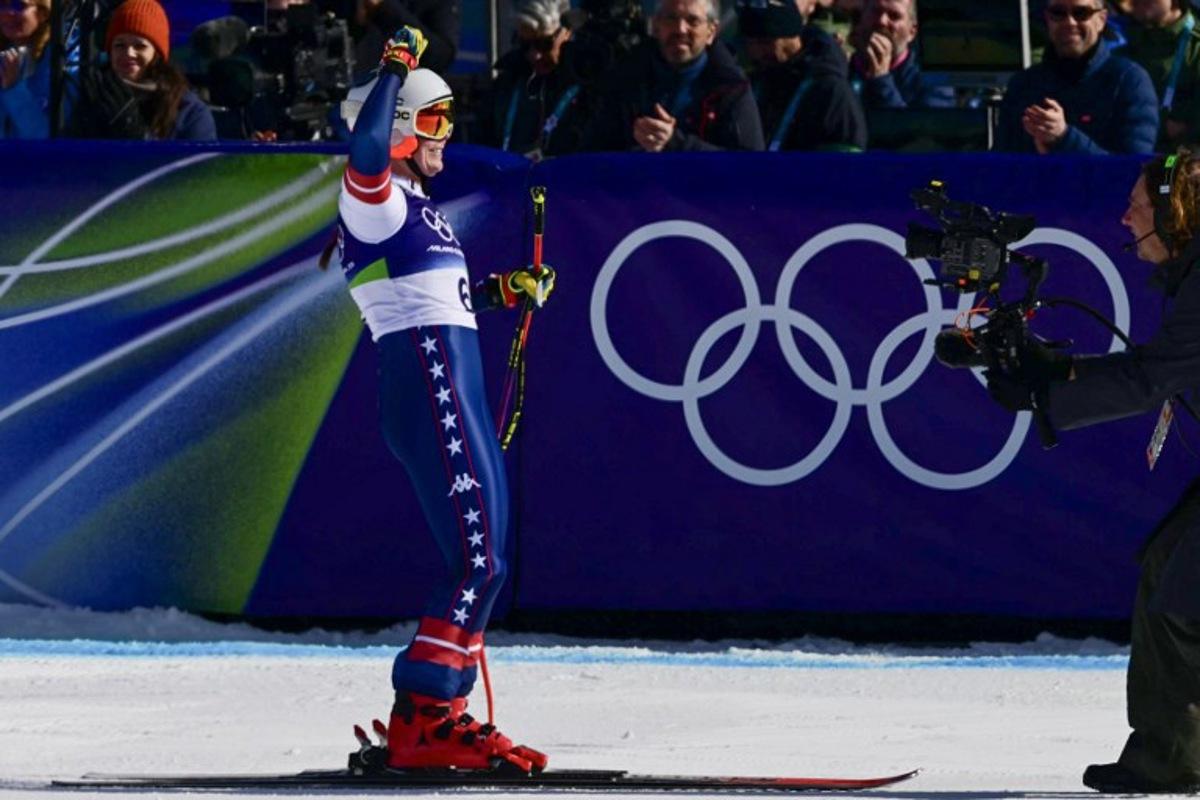US' Breezy Johnson reacts in the finish area of the women's downhill event during the Milano Cortina 2026 Winter Olympic Games at the Tofane Alpine Skiing Centre in Cortina d'Ampezzo on February 8, 2026. Stefano RELLANDINI / AFP