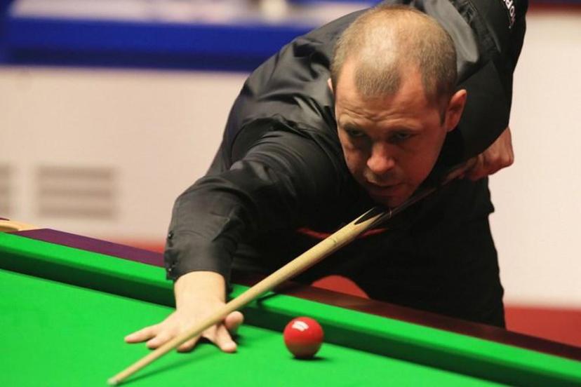 England's Barry Hawkins plays a shot during the World Championship Snooker semi-final match against Wales's Mark Williams at The Crucible in Sheffield, England on May 3, 2018. Paul ELLIS / AFP