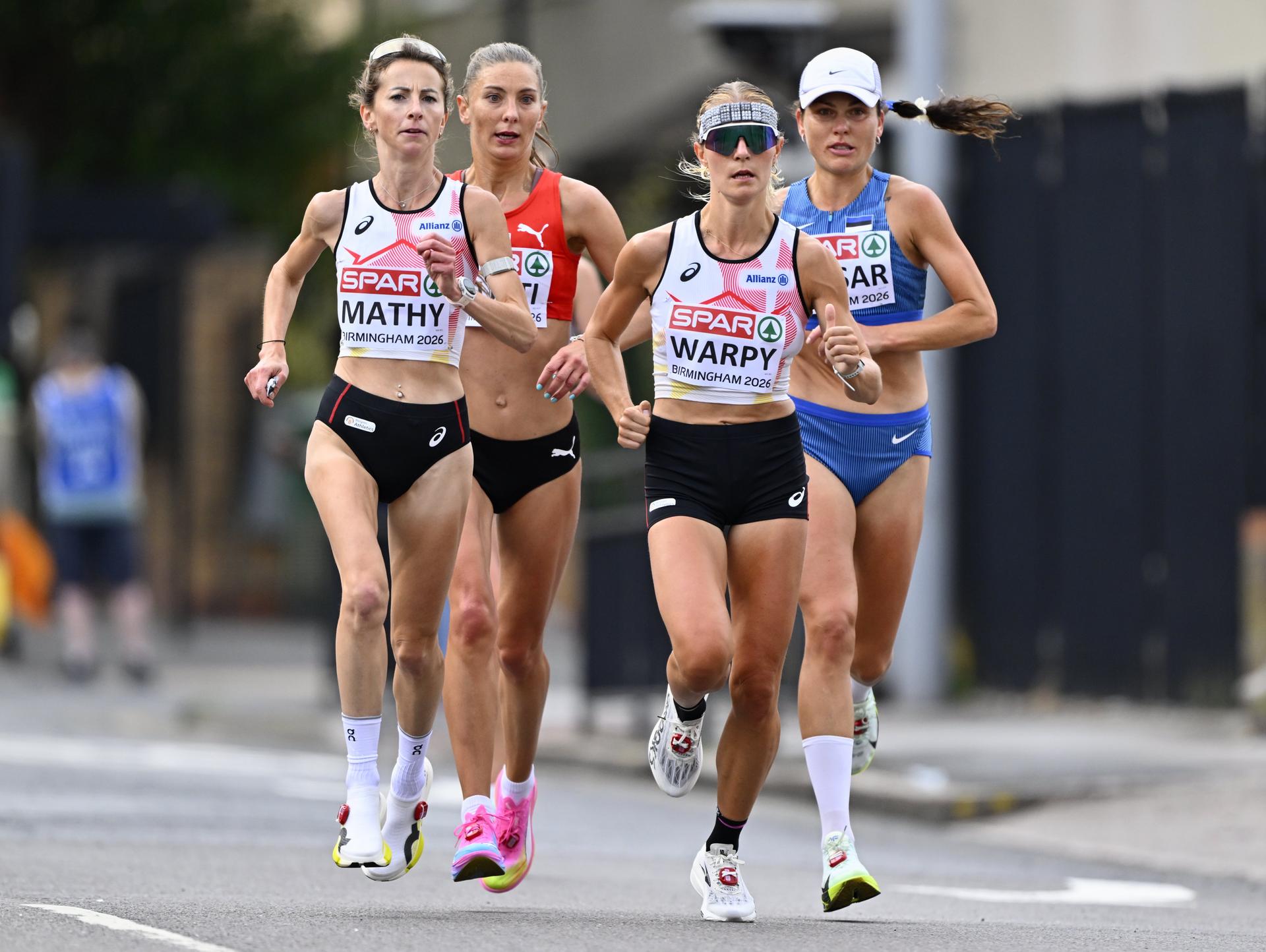 Belgian athlete Valentine Mathy and Belgian athlete Victoria Warpy pictured in action during the women marathon on the last day of the European Athletics Championships (August 10-18) in Birmingham, United Kingdom, on Sunday 16 August 2026. BELGA PHOTO ERIC LALMAND