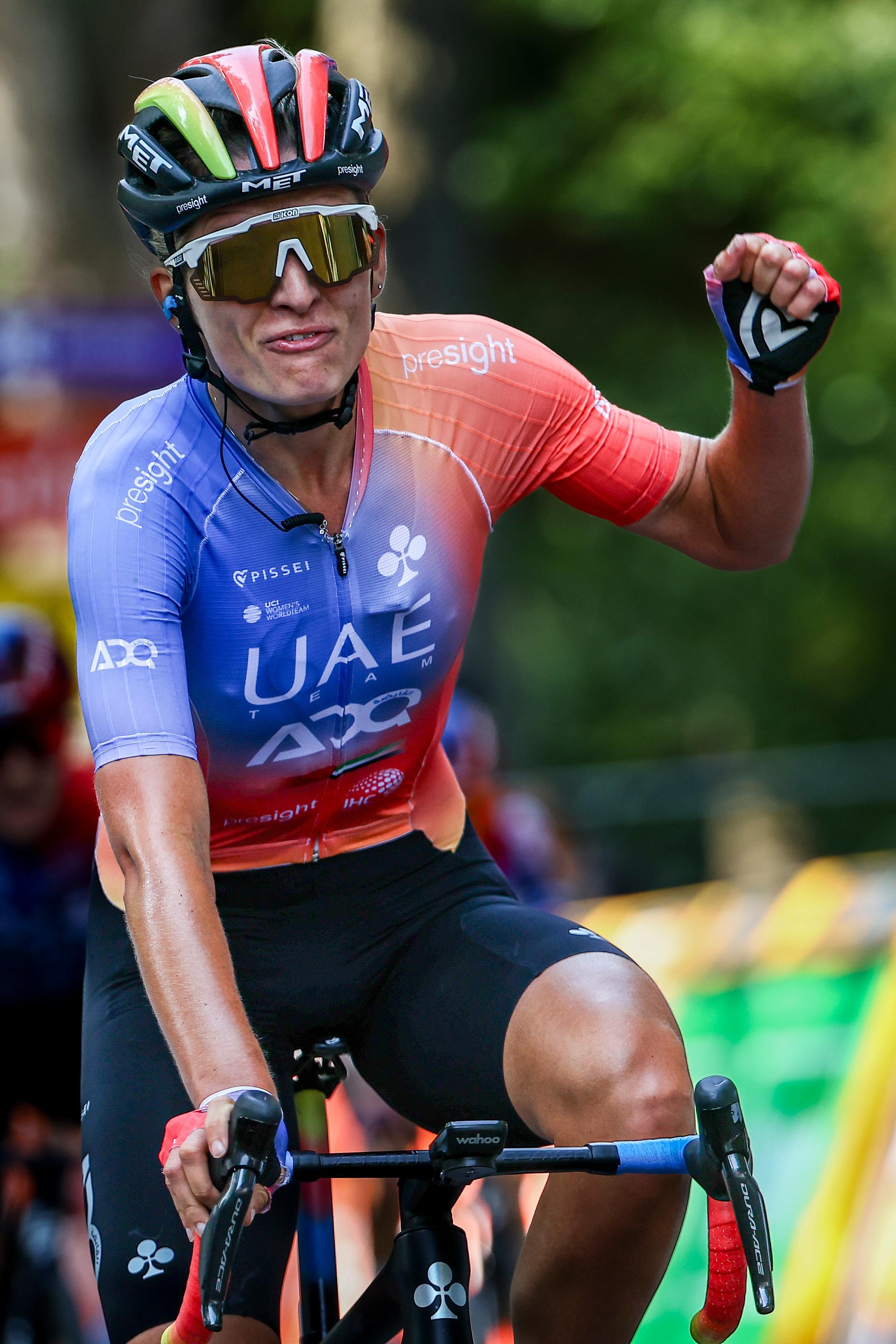 Dutch Karlijn Swinkels of UAE Team ADQ celebrates as she crosses the finish line to win the one day cycling race Grand Prix de Wallonie 2024 (139,3 km), from Blegny to the Citadelle de Namur, in Namur, on Wednesday 18 September 2024. BELGA PHOTO DAVID PINTENS