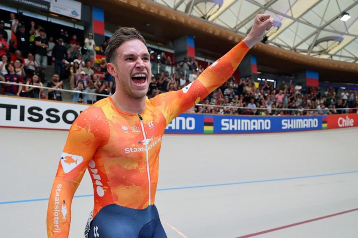 Netherlands' #168 Harrie Lavreysen celebrates winning gold in the men's sprint event final at the 2025 UCI Track World Championships, in the Penalolen Velodrome in Santiago, on October 26, 2025. Javier TORRES / AFP
