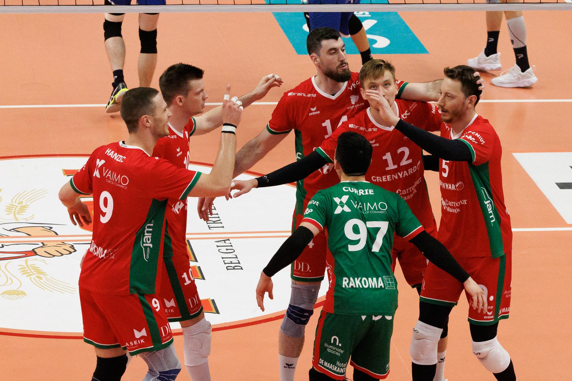 Maaseik's players celebrate after scoring during a volleyball match between Knack Roeselare and Greenyard Maaseik, Thursday 25 April 2024 in Roeselare, the fourth match of the best-of-five finals in the Play Offs of the Belgian volleyball competition. BELGA PHOTO KURT DESPLENTER