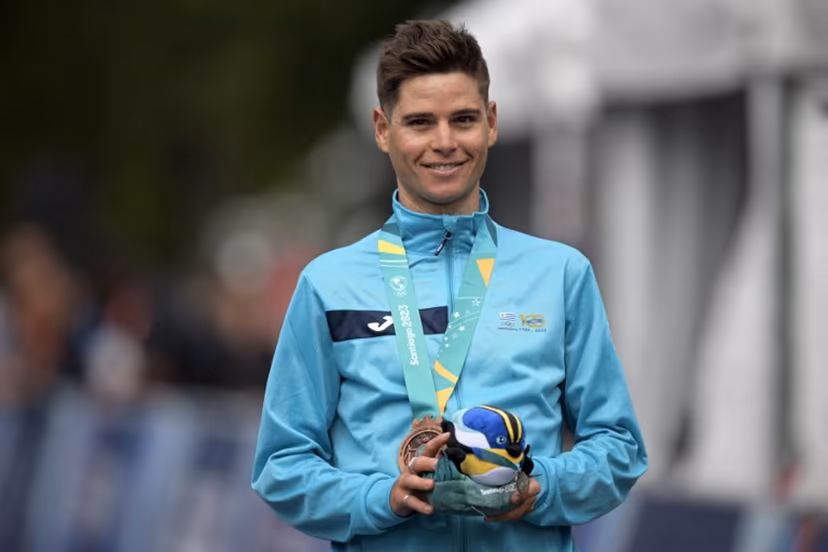 Uruguay's Antonio Eric Fagundez stands on the podium with his bronze medal in the cycling men's road race final during the Pan American Games Santiago 2023 in Santiago on October 29, 2023. ERNESTO BENAVIDES / AFP