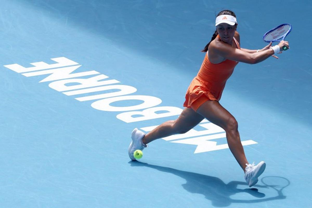 USA's Jessica Pegula hits a return to compatriot Amanda Anisimova during their women's singles quarter-final match on day eleven of the Australian Open tennis tournament in Melbourne on January 28, 2026. IZHAR KHAN / AFP