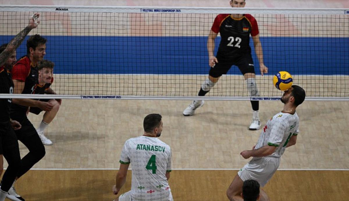 Lliya Petkov (R) of Bulgaria controls the ball against Germany during their match at the Volleyball Men's World championship in Manila on September 13, 2025. Ted ALJIBE / AFP