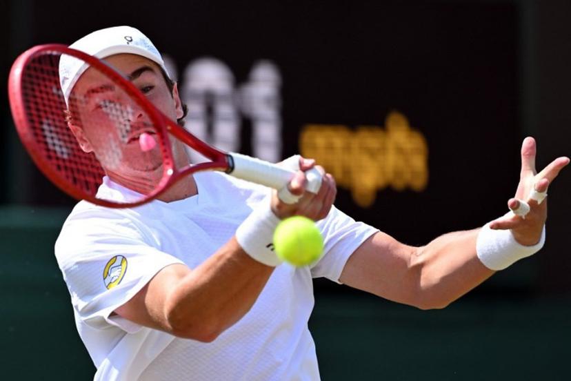 Brazil's Joao Fonseca returns to Russia's Roman Safiullin during their men's singles third round tennis match on the fifth day of the 2026 Wimbledon Championships at The All England Lawn Tennis and Croquet Club in Wimbledon, southwest London, on July 3, 2026. Kirill KUDRYAVTSEV / AFP