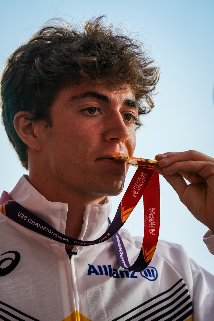 Willem Renders pictured on the podium after winning the gold medal at the 5.000m race during the European Athletics U20 Championships, in Tampere, Finland, Friday 08 August 2025. The European U20 championships take place from 07 to 10 August. BELGA PHOTO COEN SCHILDERMAN