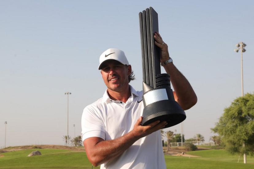 Brooks Koepka of the US celebrates his trophy after winning the 2023 LIV Golf Jeddah champion at Royal Greens Golf in Jeddah on October 15, 2023. Fayez Nureldine / AFP