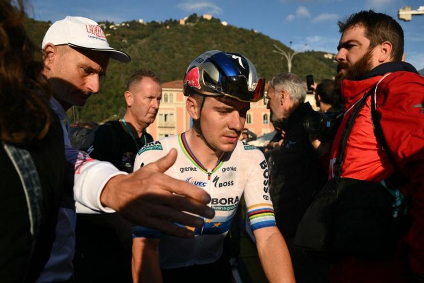 Red Bull-Bora-Hansgrohe's Belgian rider Remco Evenepoel reacts after crossing the finish line of the 120th edition of the Giro di Lombardia (Tour of Lombardy) between Bergamo and Como on October 10, 2026. Marco BERTORELLO / AFP