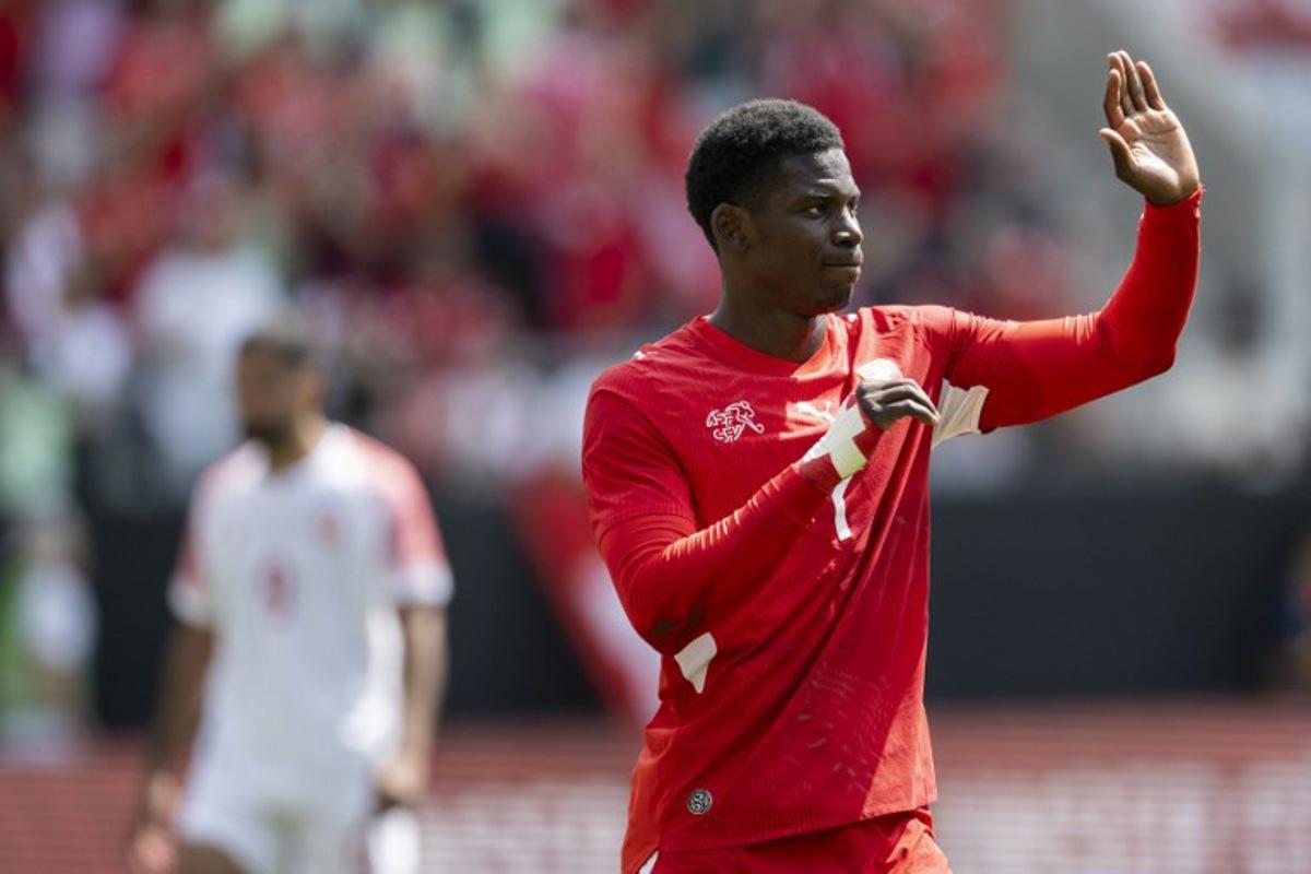Switzerland's forward #7 Breel Embolo celebrates scoring his team's first goal during a friendly football match between Switzerland and Jordan ahead of the 2026 FIFA World Cup football tournament at the Kybunpark stadium in St. Gallen on May 31, 2026. Ennio LEANZA / AFP