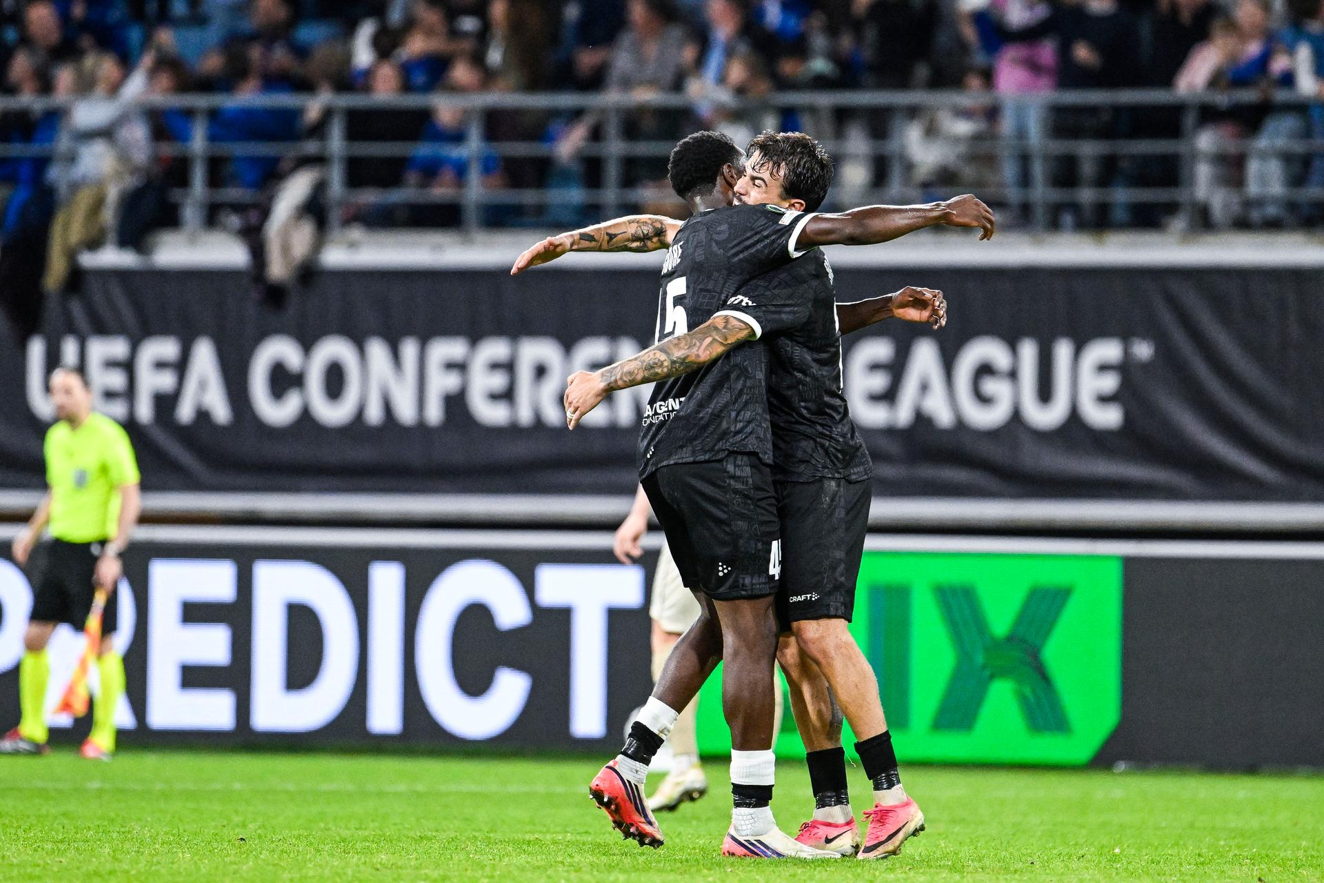 Gent's Hyllarion Goore and Gent's Tiago Araujo celebrate after scoring during a soccer game between Belgian KAA Gent and Danish Aarhus GF, Thursday 15 October 2026 in Gent, the opening match of the UEFA Conference League league phase. BELGA PHOTO TOM GOYVAERT